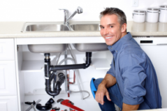 a tech prepares to replace a damaged drain line A Pleasant Hill Plumbing Contractor is always available